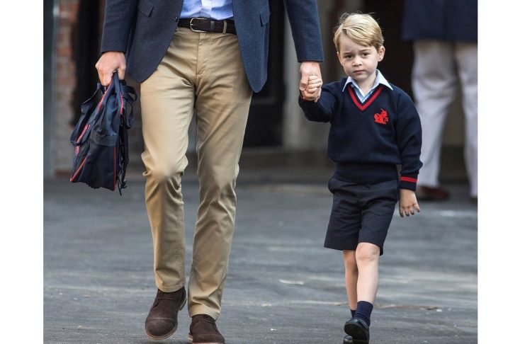 Britain’s Prince William accompanies his son Prince George on his first day of school at Thomas’s school in Battersea, London