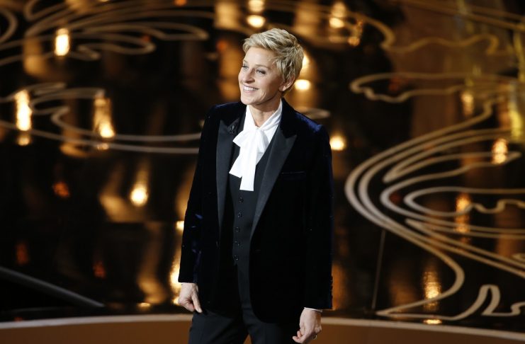 Ellen Degeneres takes the stage to host the show at the start of the 86th Academy Awards in Hollywood