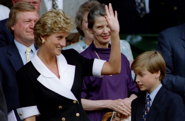 The Princess of Wales, accompanied by her son Prince William, arrives at Wimbledon’s Centre Court be..