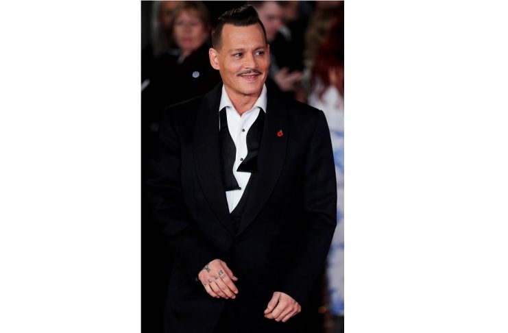 Johnny Depp arrives at the world premiere of Murder on the Orient Express at the Albert Hall in London