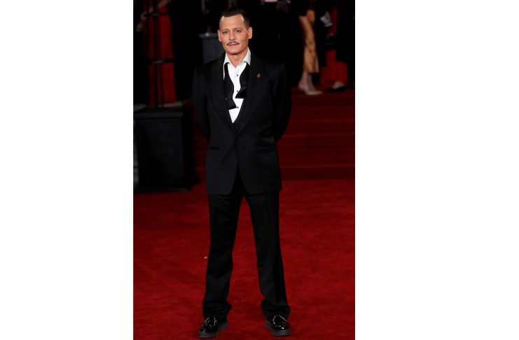 Johnny Depp arrives at the world premiere of Murder on the Orient Express at the Albert Hall in London