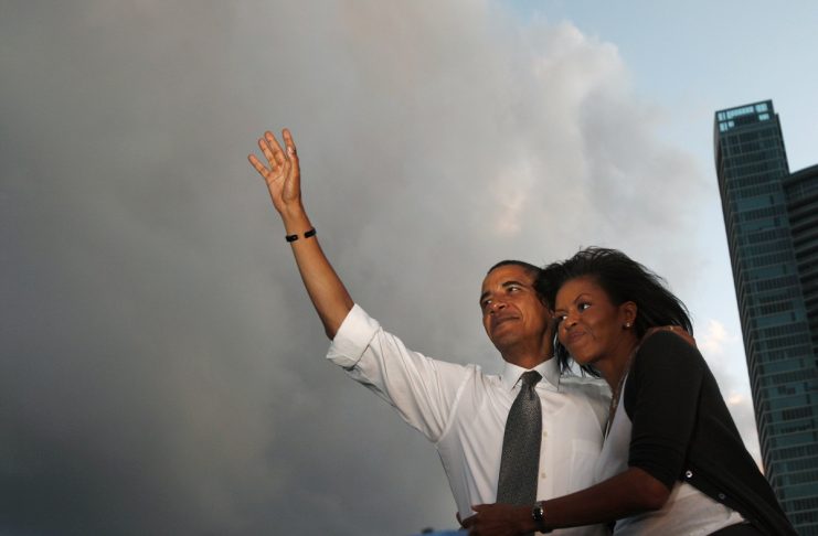 US Democratic presidential nominee Senator Barack Obama and his wife Michelle attend a campaign rally at Bicentennial Park in Miami
