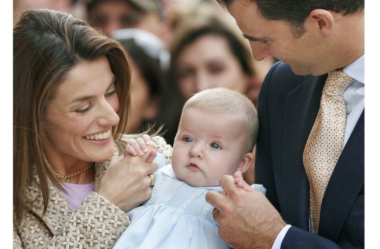Spanish Crown Prince Felipe and Princess Letizia smile at their daughter Leonor after arriving for Easter Sunday mass in Palma de Mallorca