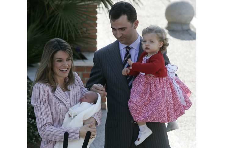 Spain’s Princess Letizia holds her new born Infanta Sofia as they leave a hospital with Crown Prince Felipe and Infanta Leonor in Madrid