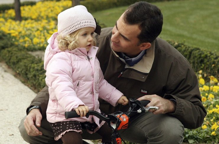 Spanish Crown Prince Felipe talks with his daugther Infanta Leonor in the gardens of their residence