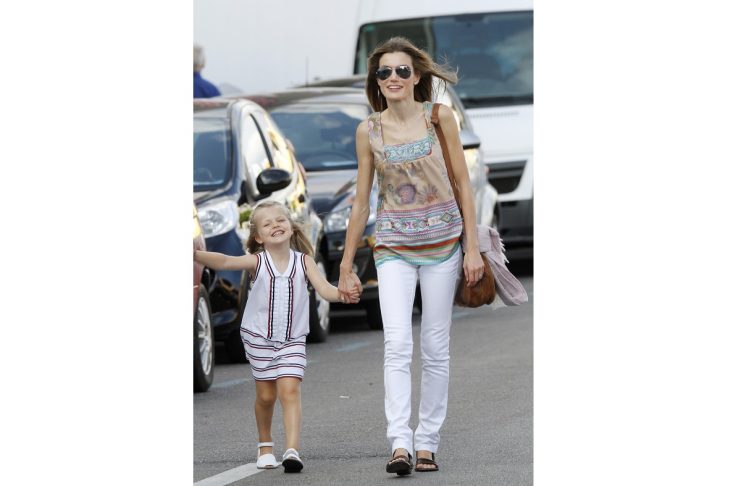 Spain’s Princess Letizia (R) walks with her daughter Infanta Leonor on the third day of the 29th Copa del Rey yacht race in Palma de Mallorca