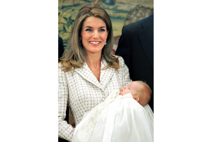Spain’s Infanta Leonor is held by her mother Princess Letizia for a photo session before a private c..