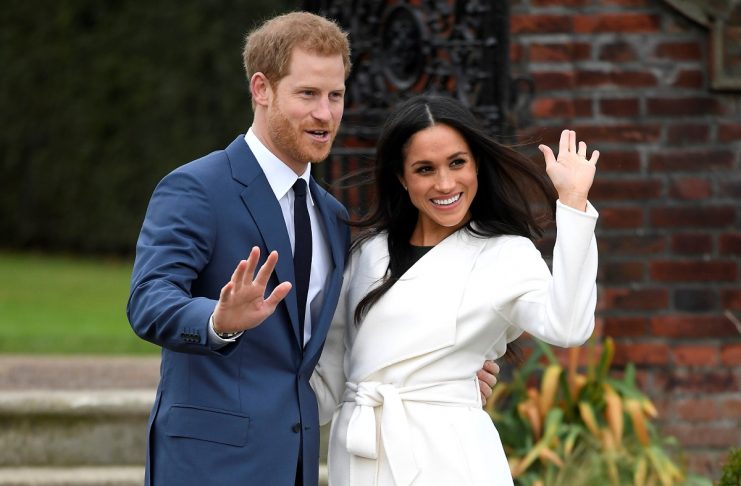 Britain’s Prince Harry poses with Meghan Markle in the Sunken Garden of Kensington Palace, London