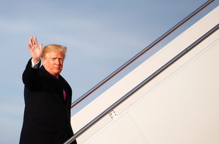 U.S. President Donald Trump boards Air Force One as they depart for Palm Beach, Florida, from Joint Base Andrews, Maryland