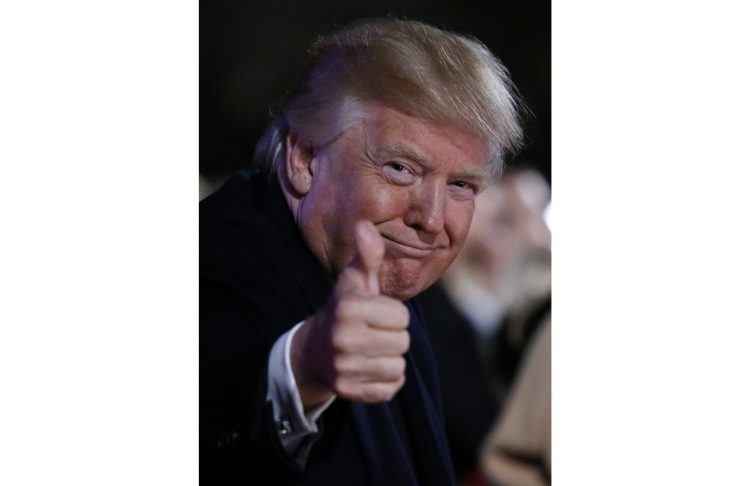 U.S. President Donald Trump participates in National Christmas Tree Lighting and Pageant of Peace ceremony near the White House in Washington
