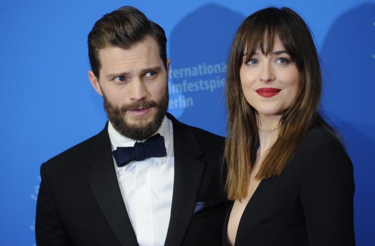 Actors Johnson and Dornan arrive for screening at 65th Berlinale International Film Festival in Berlin