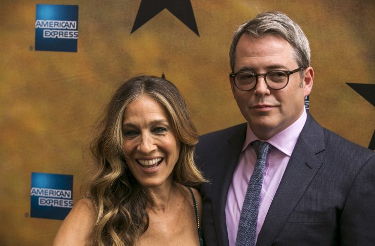 Actress Sarah Jessica Parker arrives with her husband, Matthew Broderick, for the opening night of the musical play “Hamilton,” on Broadway in New York