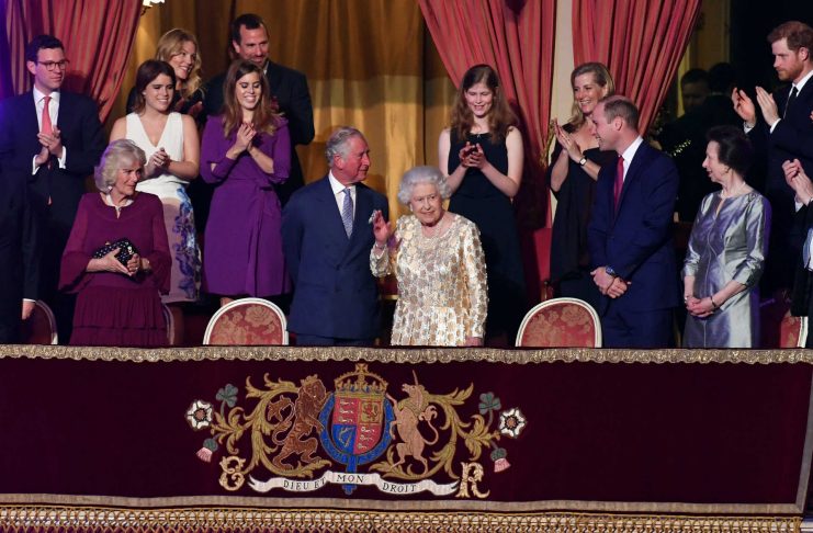 Britain’s Queen Elizabeth waves during a special concert “The Queen’s Birthday Party” to celebrate her 92nd birthday at the Royal Albert Hall in London