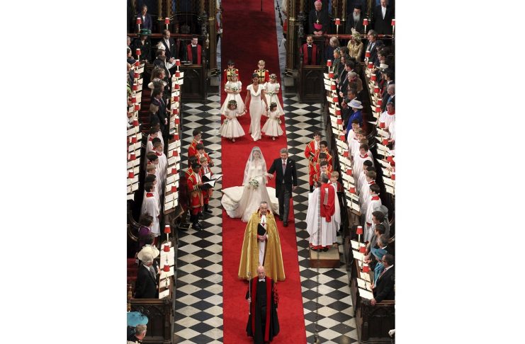 Kate Middleton walks down the isle accompanied by her father Michael Middleton at Westminster Abbey during her wedding to Prince William in London