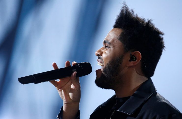 Musician The Weeknd performs during the 2016 Victoria’s Secret Fashion Show at the Grand Palais in Paris