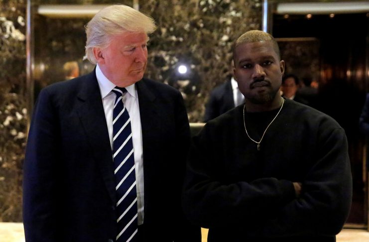 U.S. President-elect Donald Trump and musician Kanye West pose for media at Trump Tower in Manhattan, New York City