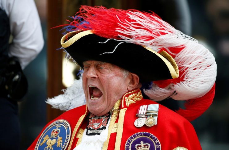 A man dressed as a town crier shouts outside the Lindo Wing of St Mary’s Hospital after Britain’s Catherine, the Duchess of Cambridge, gave birth to a son, in London