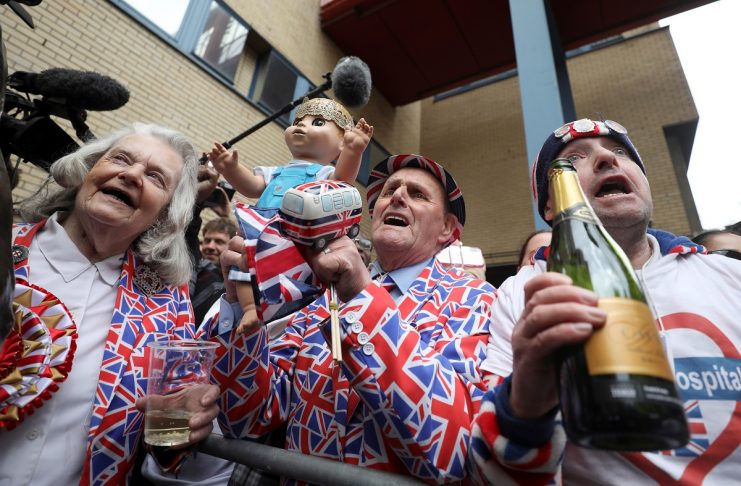 Supporters of the royal family celebrate outside the Lindo Wing of St Mary’s Hospital after Britain’s Catherine, the Duchess of Cambridge, gave birth to a son, in London