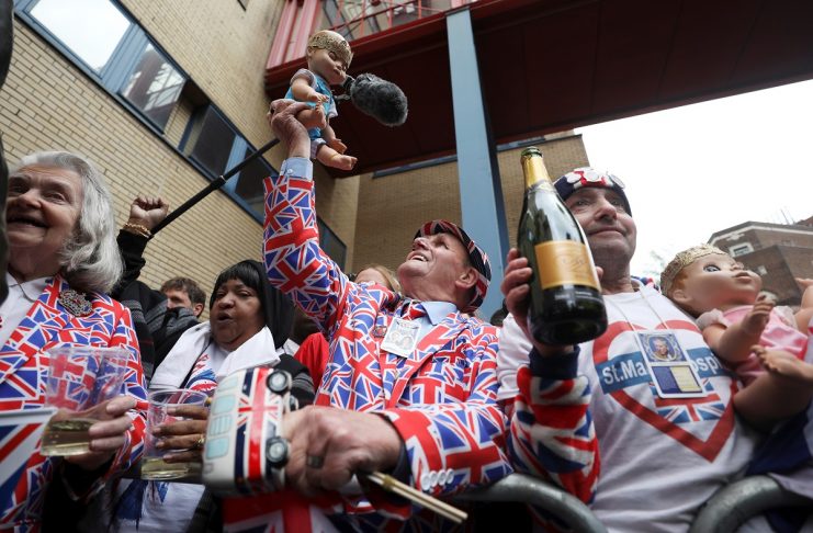 Supporters of the royal family celebrate outside the Lindo Wing of St Mary’s Hospital after Britain’s Catherine, the Duchess of Cambridge, gave birth to a son, in London