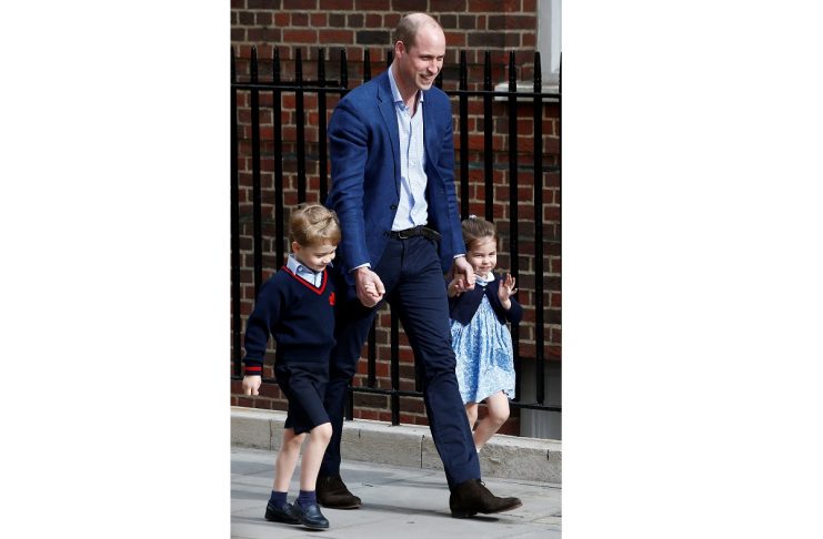 Britain’s Prince William arrives at the Lindo Wing of St Mary’s Hospital with his children Prince George and Princess Charlotte after his wife Catherine, the Duchess of Cambridge, gave birth to a son, in London