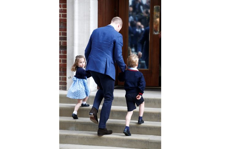 Britain’s Prince William arrives at the Lindo Wing of St Mary’s Hospital with his children Prince George and Princess Charlotte after his wife Catherine, the Duchess of Cambridge, gave birth to a son, in London