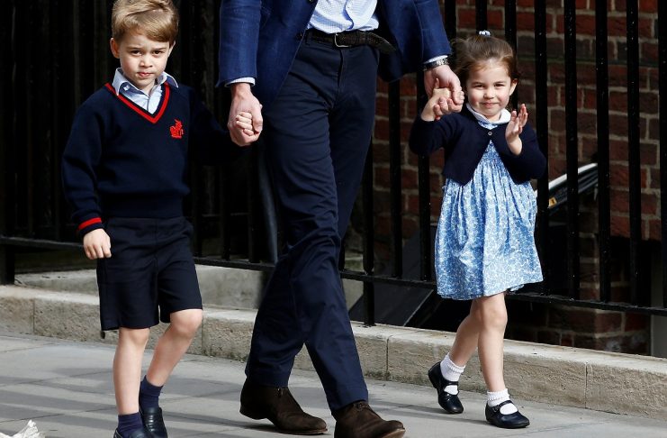 Britain’s Prince William arrives at the Lindo Wing of St Mary’s Hospital with his children Prince George and Princess Charlotte after his wife Catherine, the Duchess of Cambridge, gave birth to a son, in London