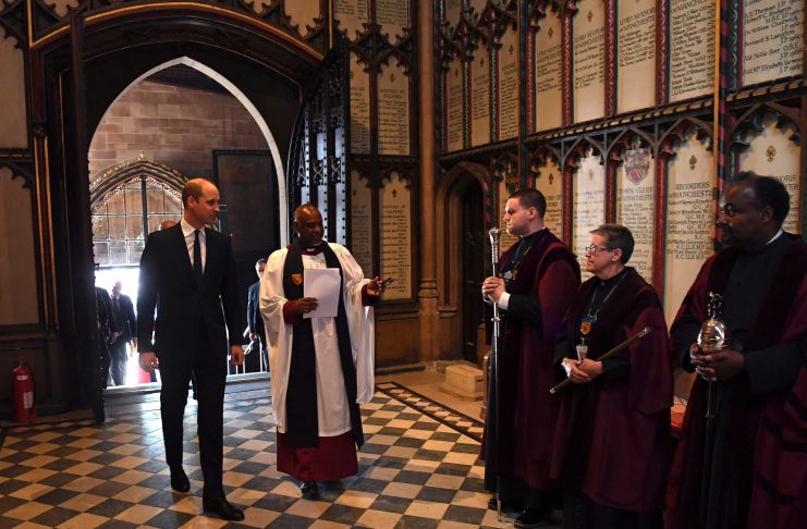 Britain’s Prince William walks with the Dean of Manchester, Rogers Govender, as he attends The Manchester Arena National Service of Commemoration at Manchester Cathedral in central Manchester