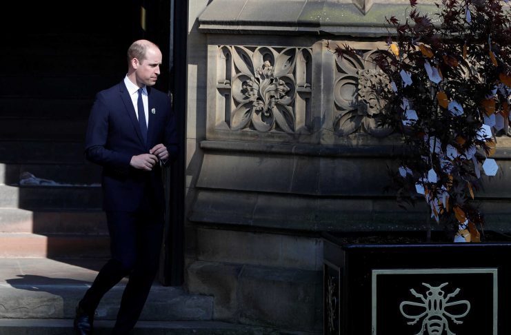 Britain’s Prince William leaves a tribute message as he leaves a memorial service on the first anniversary of the Manchester Arena bombing, in Manchester