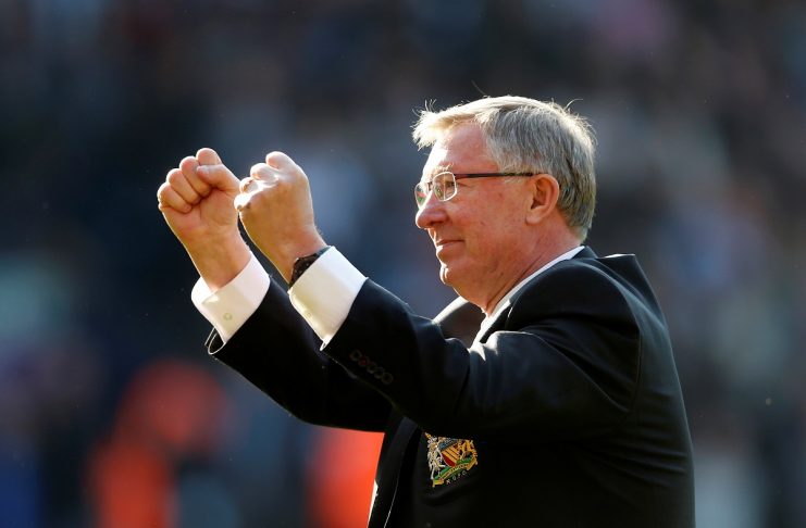 FILE PHOTO: Manchester United manager Alex Ferguson salutes the fans after their English Premier League soccer match against West Bromwich Albion at The Hawthorns in West Bromwich