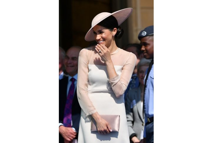 Meghan, Duchess of Sussex attends a garden party at Buckingham Palace, in London