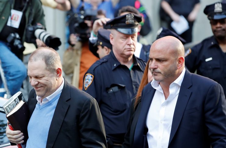 Film producer Harvey Weinstein arrives at the 1st Precinct in Manhattan in New York