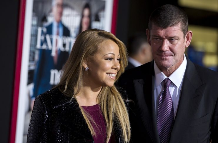 Singer Mariah Carey arrives with billionaire James Packer for the premiere of “The Intern” in New York