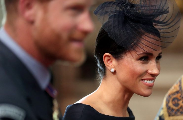 Britain’s Prince Harry and his wife Meghan, the Duke and Duchess of Sussex, arrive at Westminster Abbey for a service to mark the centenary of the Royal Air Force, in central London
