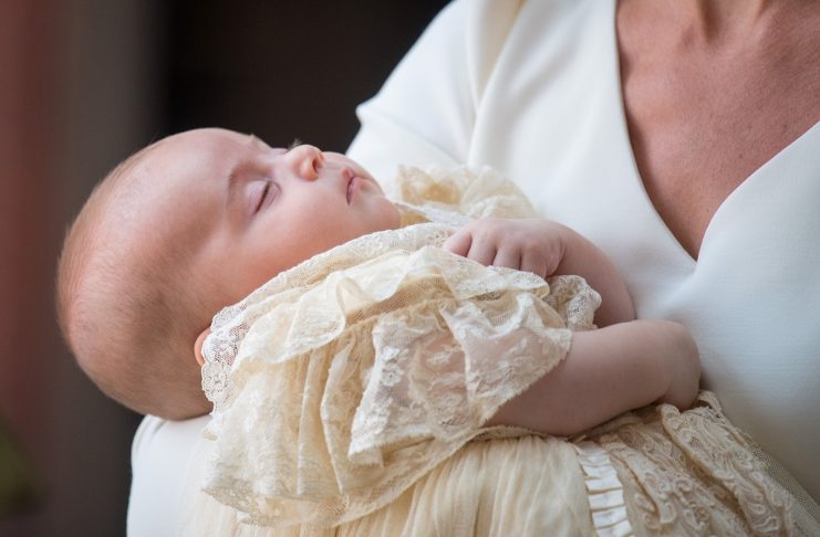 Britain’s Catherine, the Duchess of Cambridge, carries Prince Louis as they arrive for his christening service at the Chapel Royal, St James’s Palace, London