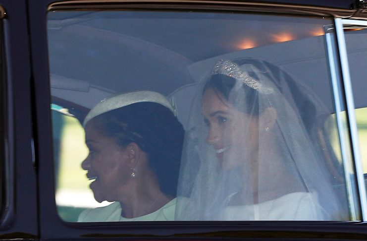 Prince Harry, Queen Elizabeth’s grandson, marries U.S. actress Meghan Markle in Windsor