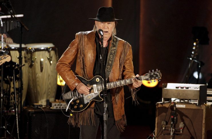 Singer/songwriter Neil Young performs during a concert honoring singer/songwriter Willie Nelson, recipient of the Library of Congress’ Gershwin Prize for Popular Song, in Washington