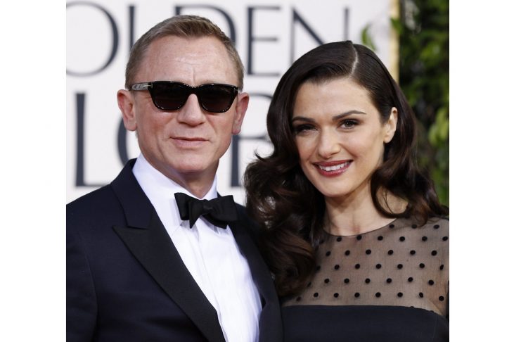 Actor Daniel Craig and his wife, actress Rachel Weisz, arrive at the 70th annual Golden Globe Awards in Beverly Hills
