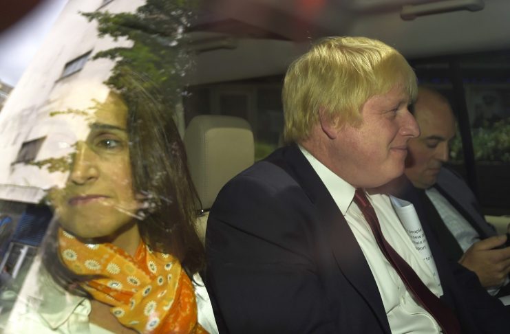 Vote Leave campaign leader, Boris Johnson, is driven away with his wife after speaking in London