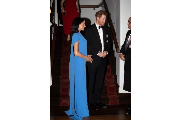 Britain’s Prince Harry and Meghan, the Duchess of Sussex, arrives for a reception and state dinner at Grand Pacific Hotel in Suva