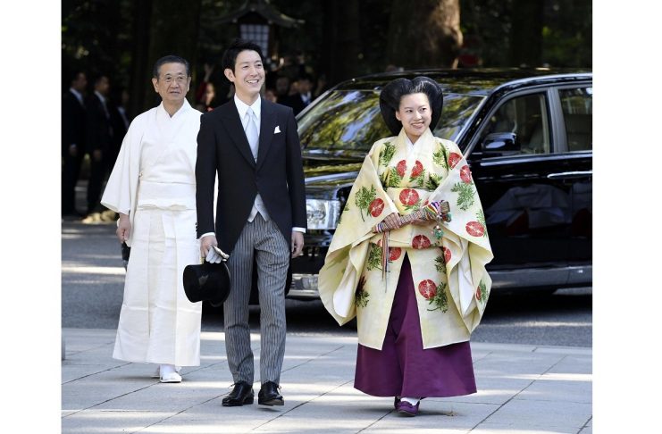 Japanese Princess Ayako and her husband-to-be Kei Moriya arrive at the Meiji Shrine for wedding ceremony in Tokyo