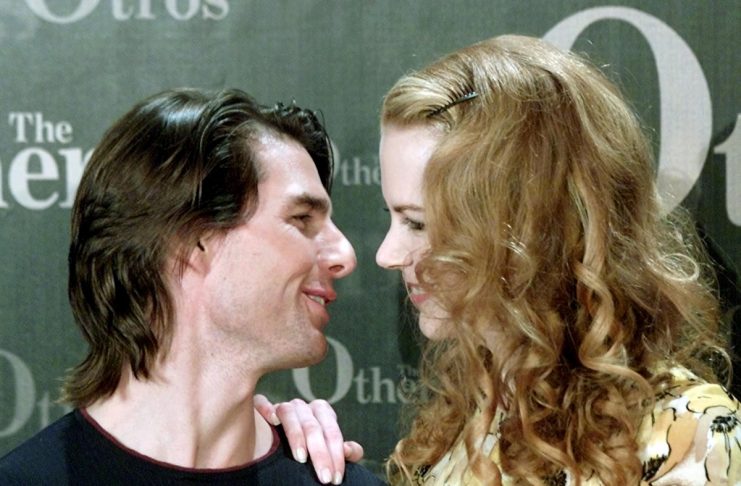US ACTOR CRUISE AND WIFE KIDMAN GET CLOSE DURING PHOTOCALL.