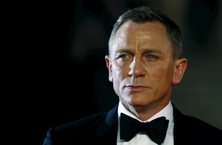 Daniel Craig poses for photographers as he attends the world premiere of the new James Bond 007 film “Spectre” at the Royal Albert Hall in London, Britain