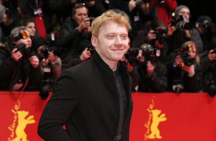 Actor Grint poses on red carpet as he arrives for the screening of the film “The Necessary Death of Charlie Countryman” at the 63rd Berlinale International Film Festival in Berlin