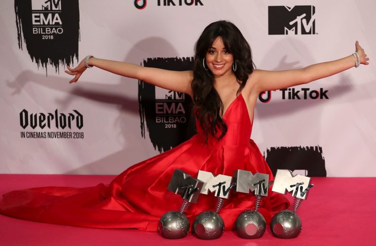 Camila Cabello poses with her awards during the 2018 MTV Europe Music Awards at Bilbao Exhibition Centre in Bilbao