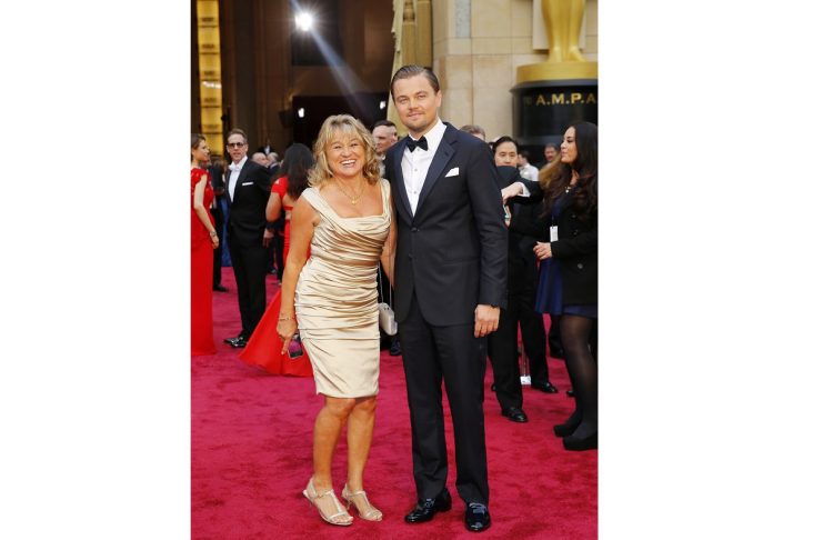 Leonardo DiCaprio and his mother Irmelin DiCaprio arrive on the red carpet at the 86th Academy Awards in Hollywood