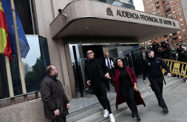 Portugal’s soccer player Cristiano Ronaldo leaves after appearing in court on a trial for tax fraud in Madrid