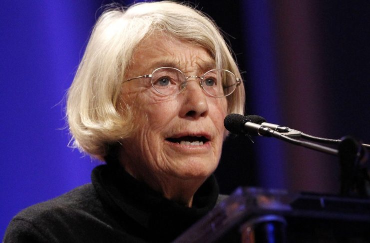 Poet Oliver reads one of her poems during the lunch session at The Women’s Conference in Long Beach