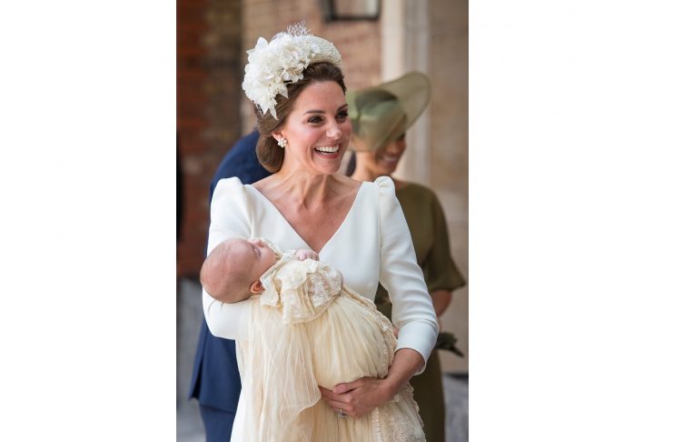 Britain’s Catherine, the Duchess of Cambridge, carries Prince Louis as they arrive for his christening service at the Chapel Royal, St James’s Palace, London