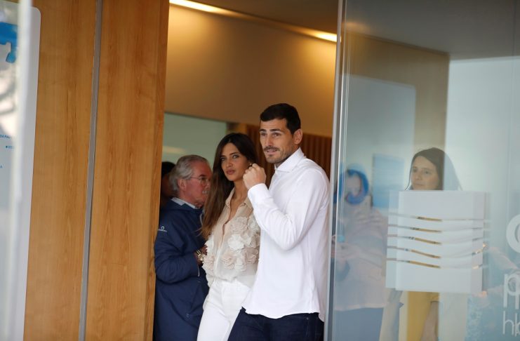 Spanish soccer player Iker Casillas leaves CUF Porto hospital accompanied by his wife Sara Carbonero in Porto