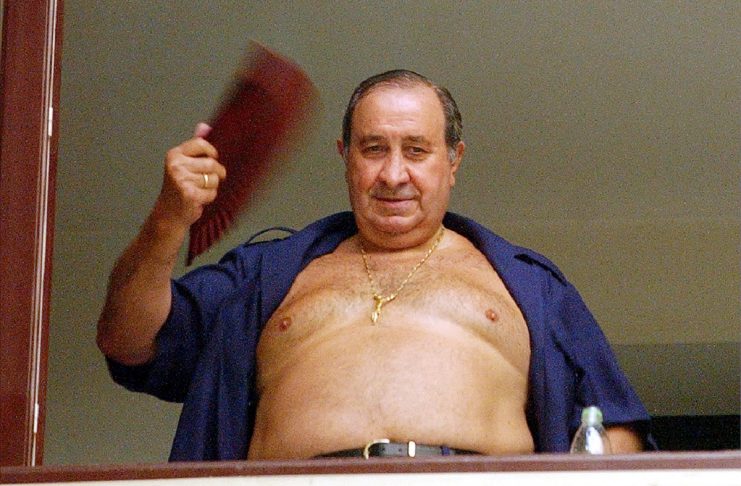 FORMER MARBELLA MAYOR JESUS GIL FANS HIMSELF IN WINDOW OF MALAGA IN THIS FILE PICTURE.